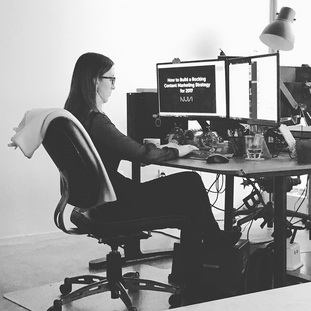 Brittany Zerr working at her desk at Kick Point