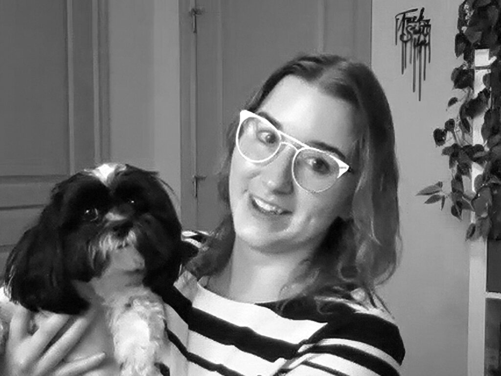 Brittany and her dog Peach on a Zoom video call