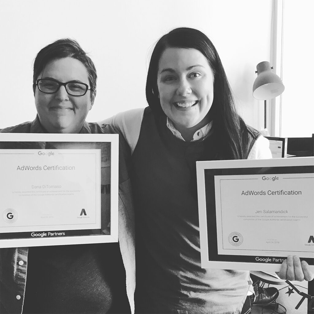 Dana and Jen pose with their AdWord Certificates