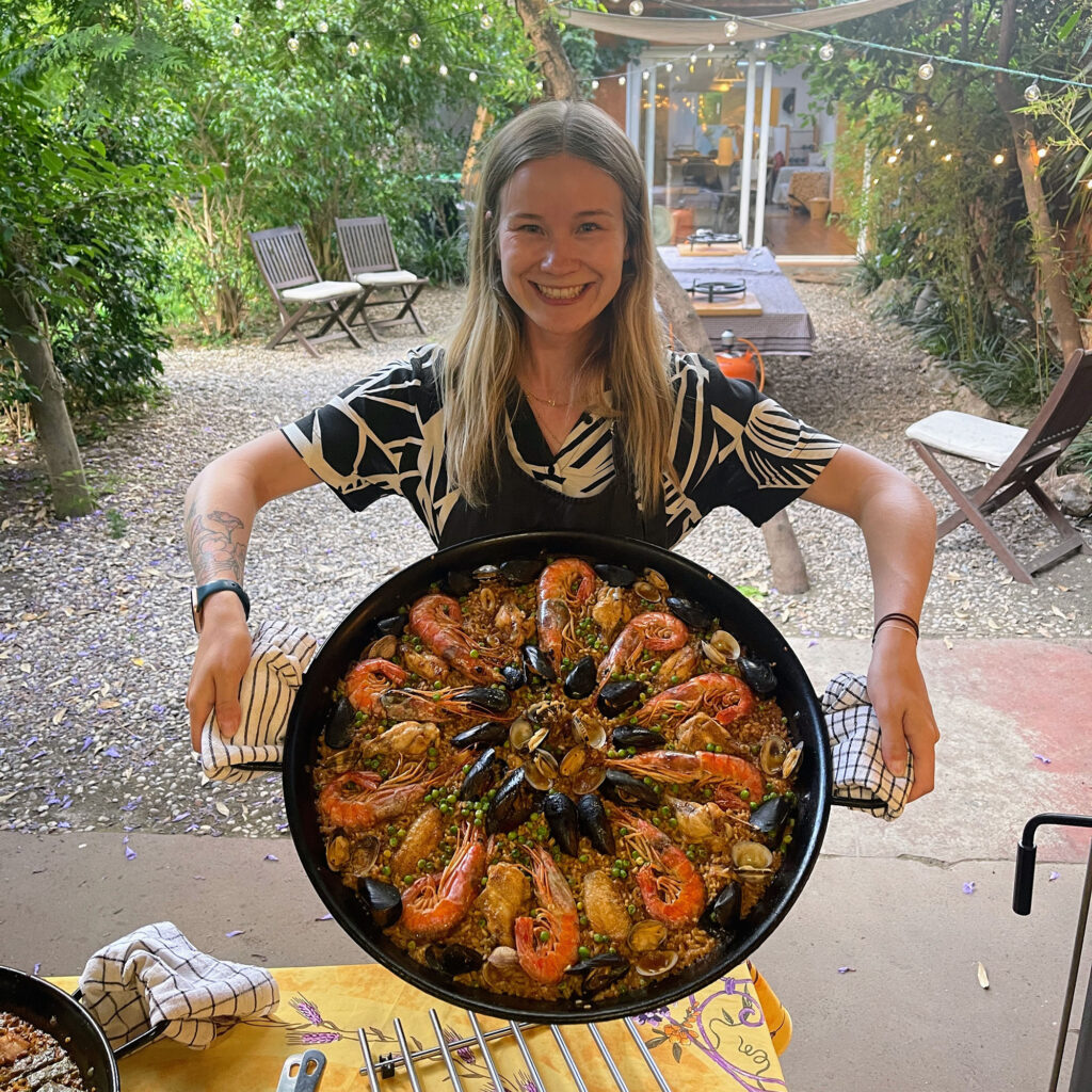 Sammy with a massive pan of paella.